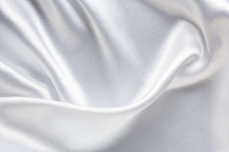 white silk satin fabric with large folds, elegant abstract backgroundの素材 [FY310136050949]