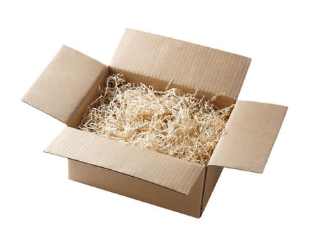 open corrugated cardboard box with gift filling isolated on white background