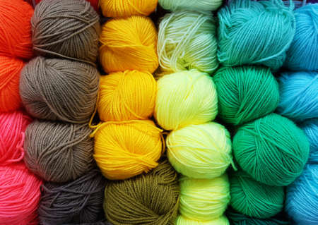bright skeins of yarn as background