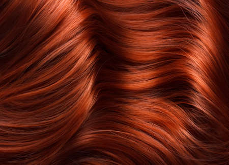 wavy bright red hair textureの写真素材