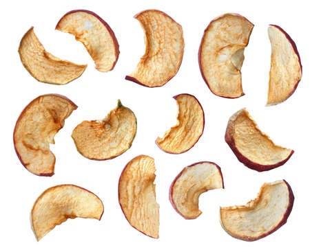 set of homemade dried apple slices isolated on white backgroundの写真素材