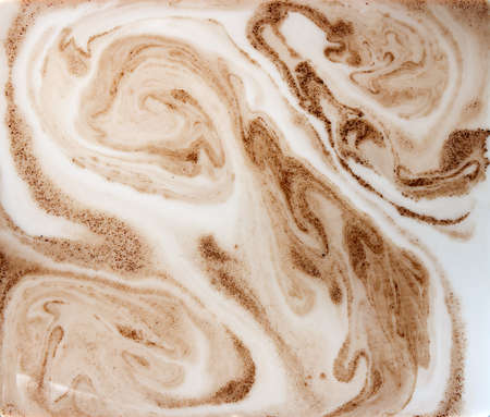 mixing chicory powder with milk, abstract backgroundの写真素材