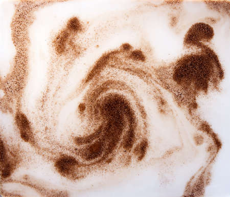 mixing coffee or chicory powder with milk, macroの写真素材
