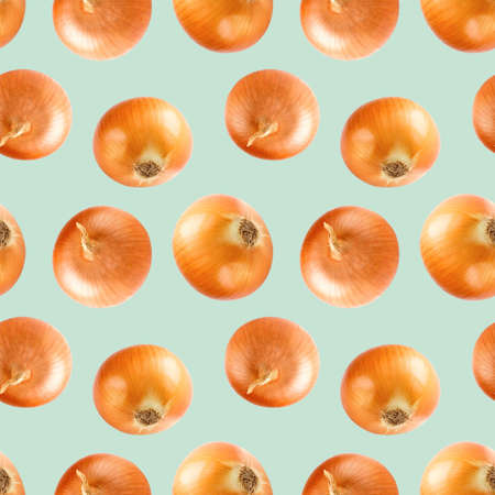 seamless food pattern with onions on light green backgroundの写真素材