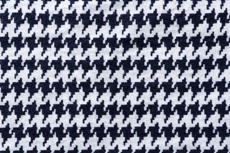 Knitted fabric jersey texture with goose foot pattern macroの写真素材