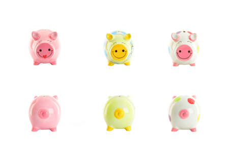 colorful piggy banks isolated on white backgroundの写真素材