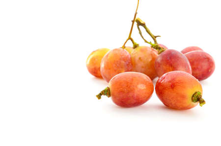 close up of red grapes on white backgroundの写真素材