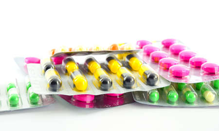 capsules in blister packs on white backgroundの写真素材
