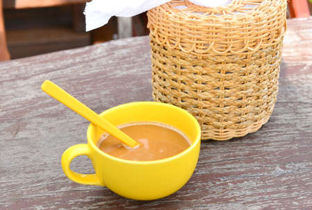 Coffee cup on wooden tableの写真素材
