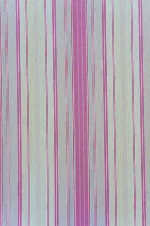 Background texture of a curtain with rose vertical linesの写真素材
