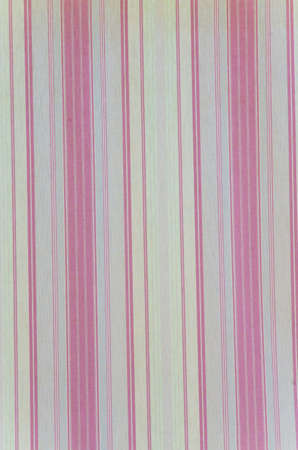 Background texture of a curtain with rose vertical linesの写真素材