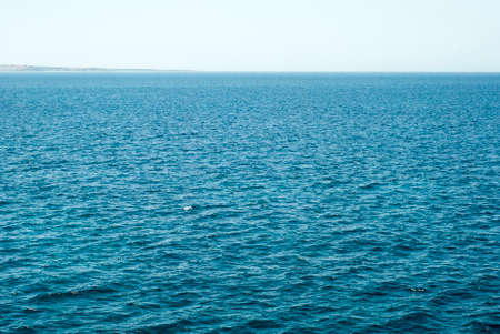 expanse of blue water choppy sea with calm horizon