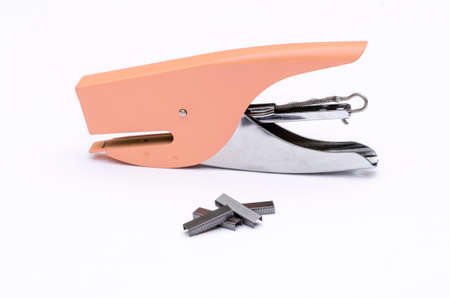 metal rose office stapler with metal staple for office in white backgroundの写真素材