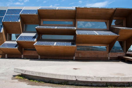 Public building made of solar panels, wood and mirror glass in Barcelonaの写真素材