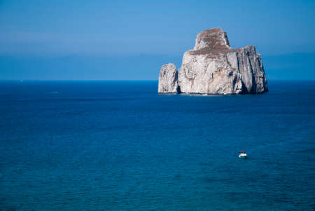 Pan di Zucchero rocks in the sea, in Masua (Nedida), Sardinian coast. Daily timeの写真素材