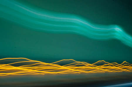 Green abstract background. Lines and curves concept of speed. Photo resultの写真素材