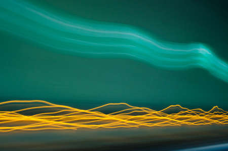 Green abstract background. Lines and curves concept of speed. Photo resultの写真素材