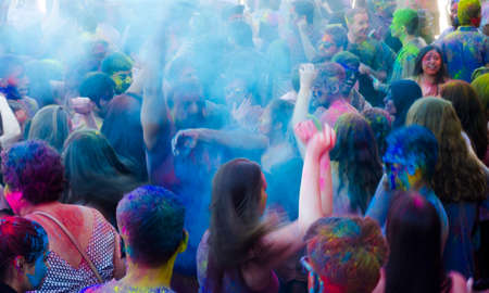 London Ontario, Canada - April 16:  Motion effect for unidentified young colorful people having fun at the Festival of Colours  on April 16.2016 in London Ontario, Canada as editorialのeditorial素材