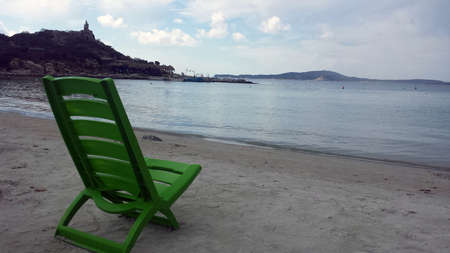 Punta Molentis Beach, Villasimius - 26 Septmber, 2016: Beach scene with black clouds in the sky as bad weather (Editorial)のeditorial素材