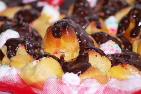 colorful french pastry with cream and chocolate sauce. Dessert foodの写真素材