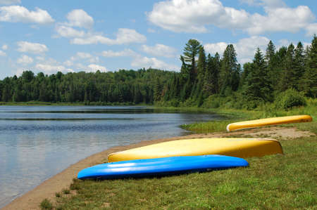 Three kayaks on a beachの写真素材