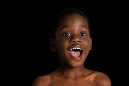 Small child's face showing emotion. One of a series of black and white images isolated on white.の写真素材