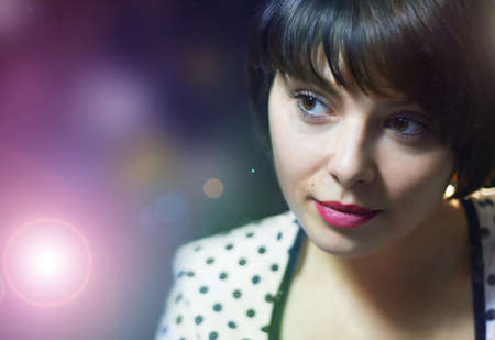 Portrait of woman looking at something の写真素材