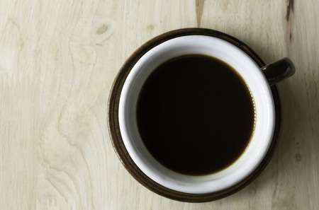 coffee cup top view on the wood. Black coffeeの写真素材