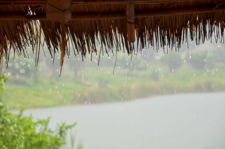 Rain drop on a wood houseの写真素材