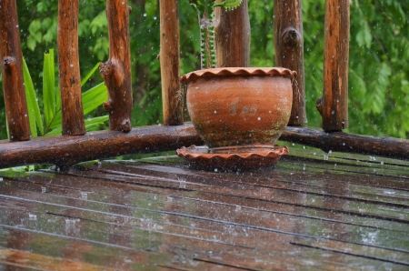 Rain drop on a wood houseの写真素材