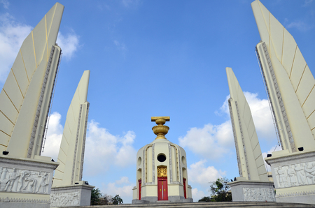 Democracy of Monument and four wing-like structures which guard the Constitution, representing the four branches of the Thai armed forces on Ratchadamnoen Klang at Bangkok Thailand の写真素材