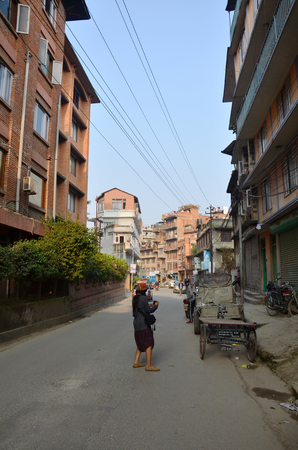 Thai women walking go to Patan Durbar Square is situated at the centre of Lalitpur Sub-Metropolitan City on November 2, 2013 in Patan Nepalのeditorial素材