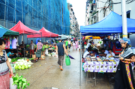 Thai women portrait at rangoon market on July 12, 2014 in Yangon, Burma.のeditorial素材