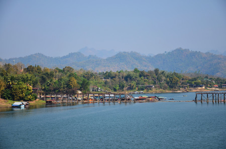Saphan Mon Broken - The 400m wooden bridge itself is well worth a visit and is the longest handmade wooden bridge in Sangkhlaburi Kanchanaburi Thailand.の写真素材