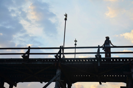 Thai women portrait at Saphan Mon - The 400m wooden bridge itself is well worth a visit and is the longest handmade wooden bridge in Sangkhlaburi Kanchanaburi Thailandの写真素材