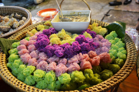 Thai Dessert Coloful Vermicelli Fermented Rice Flour Noodles  with with fish curry crab sauceの写真素材
