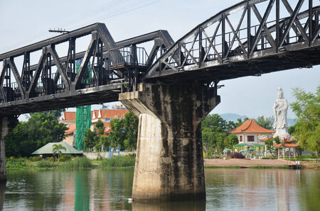 Bridge of the River Kwai. Internationally famous,  black iron bridge was built from  by Japanese supervision by Allied prisoner-of-war labour as part of the Death Railway linking Thailand with Burma.のeditorial素材