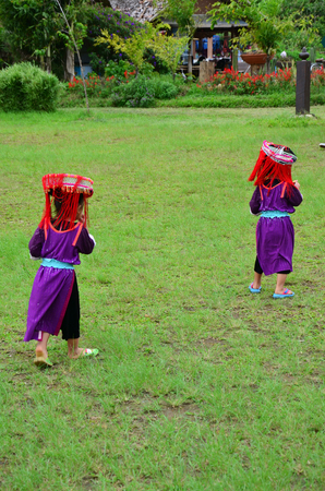 Children Hmong People at Doi Kiew Lom waiting service the traveler for take photo with them on JULY 13, 2014 in Mae Hong Son, Thailand.のeditorial素材