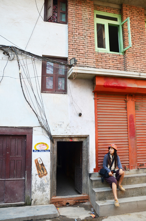 Thai women at Patan Durbar Square is situated at the centre of Lalitpur Sub-Metropolitan City on November 2, 2013 in Patan Nepalのeditorial素材
