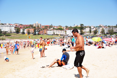 Traveler and Australian people come to Bondi Beach for relax and swimming or surfing at Sydney on January 1, 2015 in New South Wales, Australia.のeditorial素材