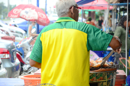 Grilled prawns on Stove Thai Style for sale at Seafood Market in Bangkok Thailand.の写真素材