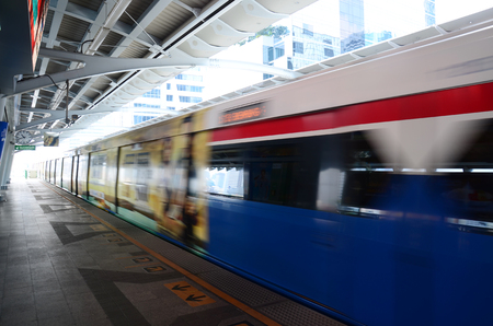 BTS or Skytrain stop receive people at Prathumwan Station on April 5, 2015 in Bangkok Thailand