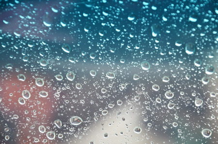 Raindrop on Glass plate Backgroundsの写真素材