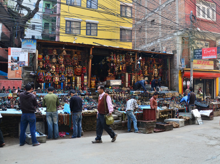 Souvenir shop and Local people on the street at Thamel market on October 29, 2013 in Kathmandu,...