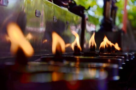 Tradition and culture of thailand .Oil lamps put in the lamp of birthday.の写真素材
