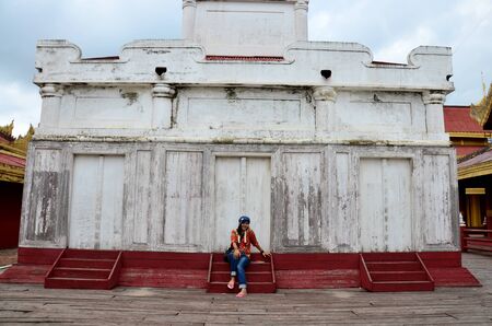 Thai women travel and portrait at Mandalay Palace in Mandalay, Myanmar.の写真素材