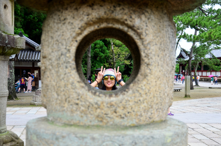 Thai woman portrait at the garden of Todai-ji Temple on July 9, 2015 in Nara, Japanのeditorial素材