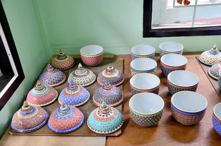 Traditional thai five basic colors style pottery wait bring to process fire oven Ceramic Benjarong at Ban Don Kai Dee on August 8, 2015 in Samut Sakhon Thailand.のeditorial素材