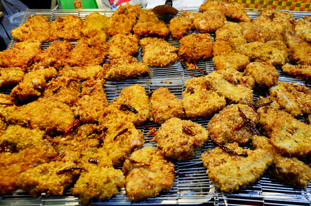Fried pickled fish for sell at marketの写真素材