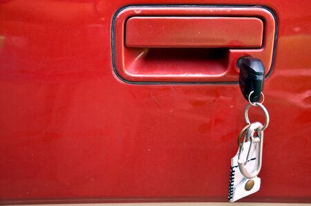 Key at lock on car photo location in Nonthaburi, Thailandの写真素材